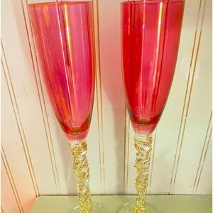 Beautiful burgandy Chrystal fluted champagne glasses